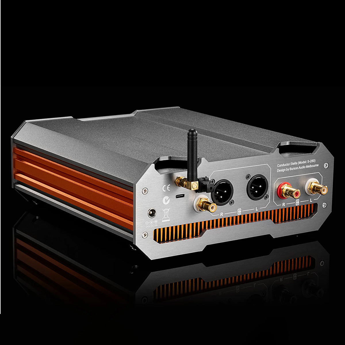 Silver and orange audio component with XLR outputs, RCA jacks, and a Bluetooth antenna
