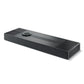 Sleek black soundbar with a brushed metal top, fabric grille, and circular control dial