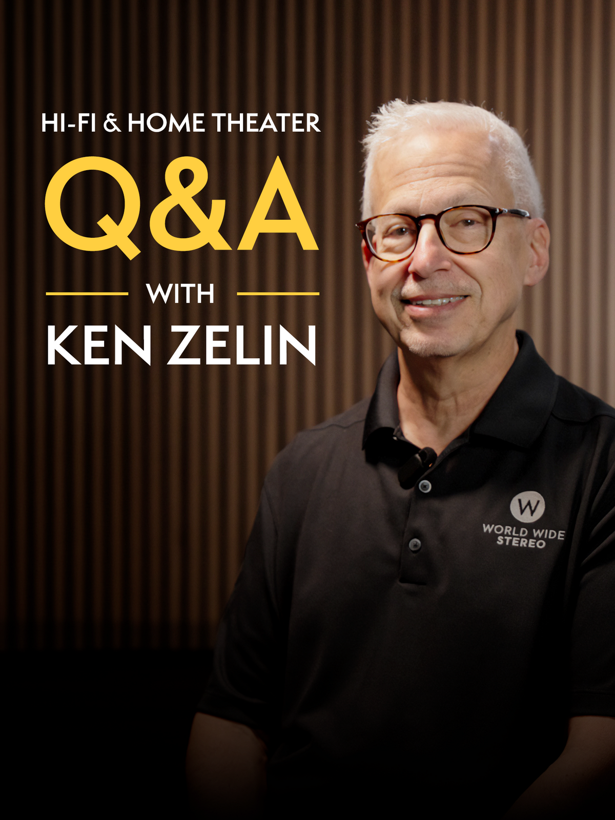 Portrait of Ken Zelin wearing a black polo shirt with a World Wide Stereo logo and glasses