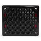 Black rectangular speaker grille with a geometric honeycomb pattern and red accents