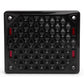 Black rectangular speaker grille with a geometric honeycomb pattern and red accents