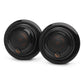 Pair of black round car speakers with perforated grilles and copper-colored logos