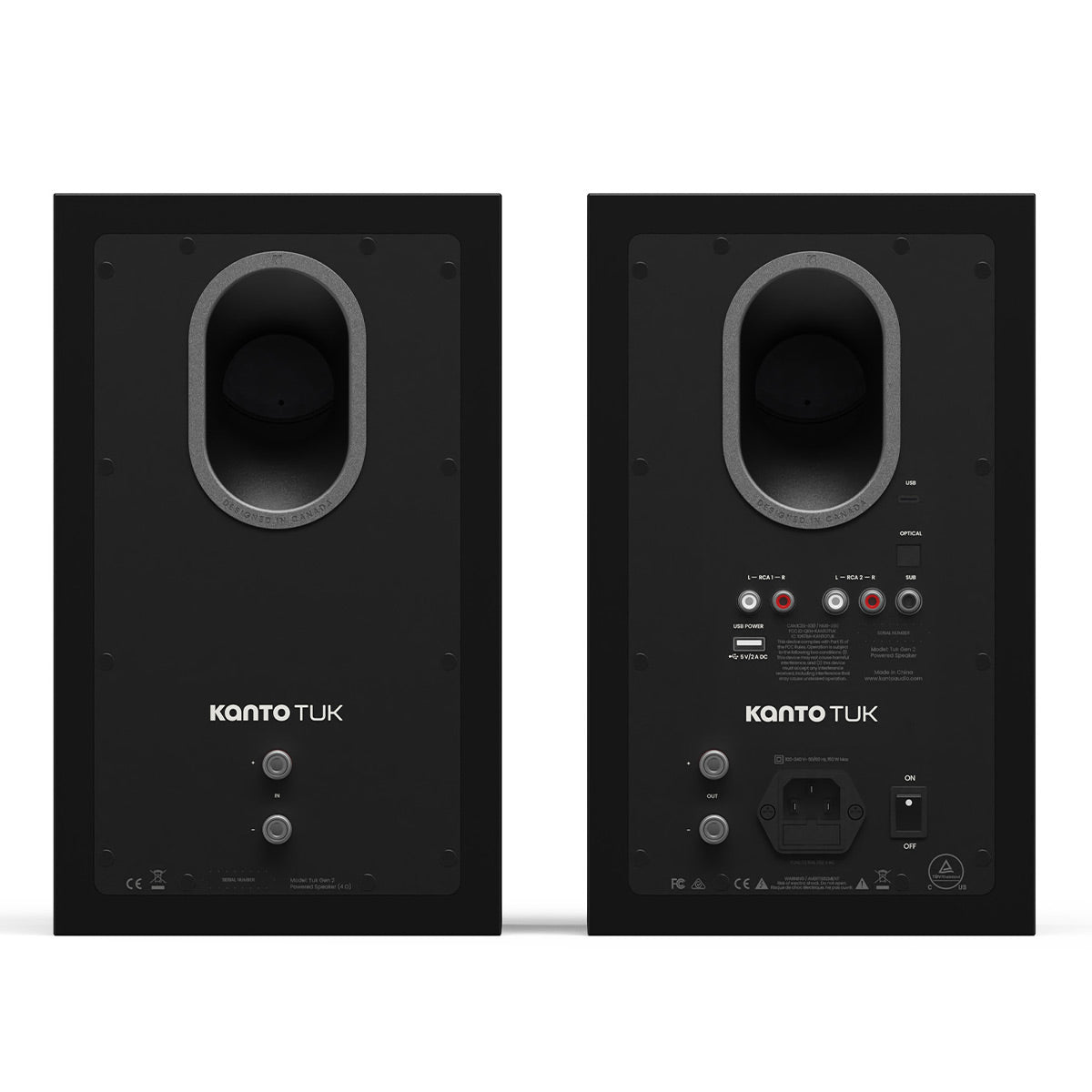 Matte black bookshelf speakers with rear-facing ports and multiple input connections