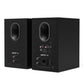 Matte black bookshelf speakers showing rear panels with oval ports and multiple input jacks