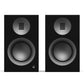 Matte black bookshelf speakers with silver tweeter grilles and textured woofer surrounds