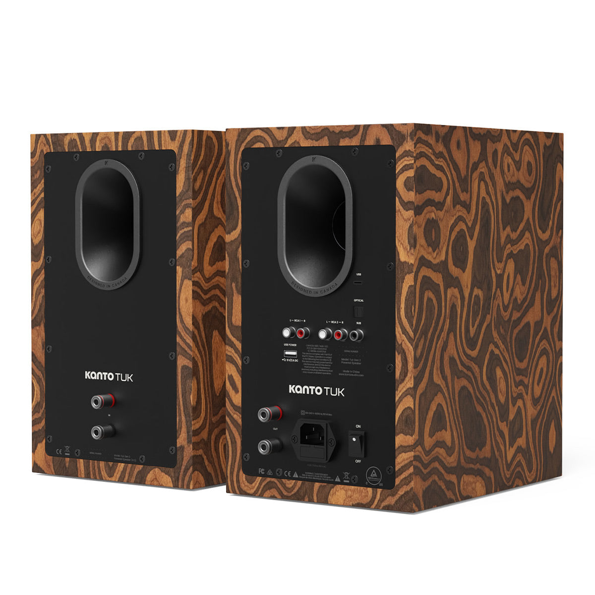 Pair of bookshelf speakers with a dark wood grain finish and black rear panels featuring multiple in