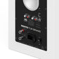 Matte white speaker rear panel with RCA inputs, optical port, and power switch