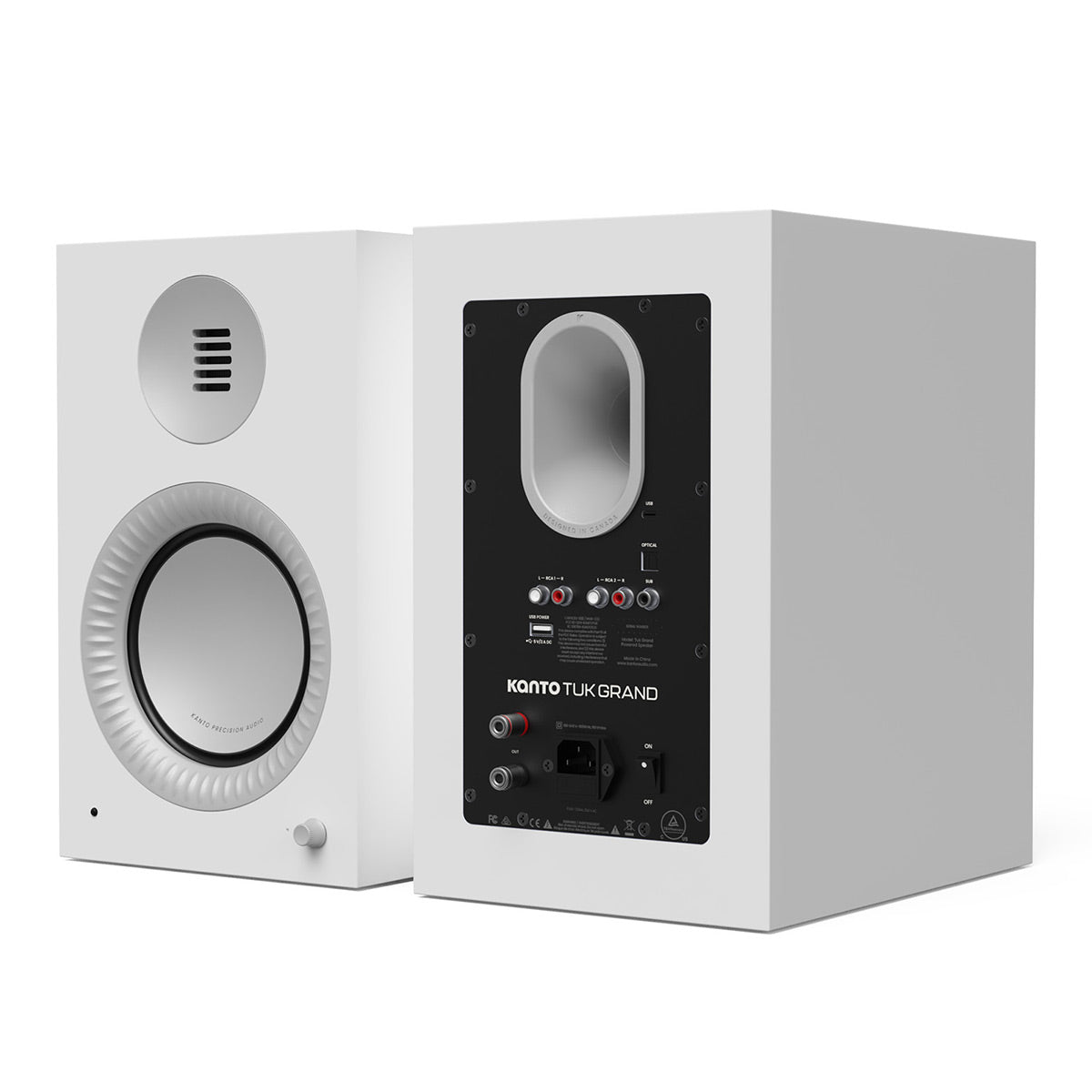 Matte white bookshelf speaker with a front-facing woofer and rear panel featuring multiple input por