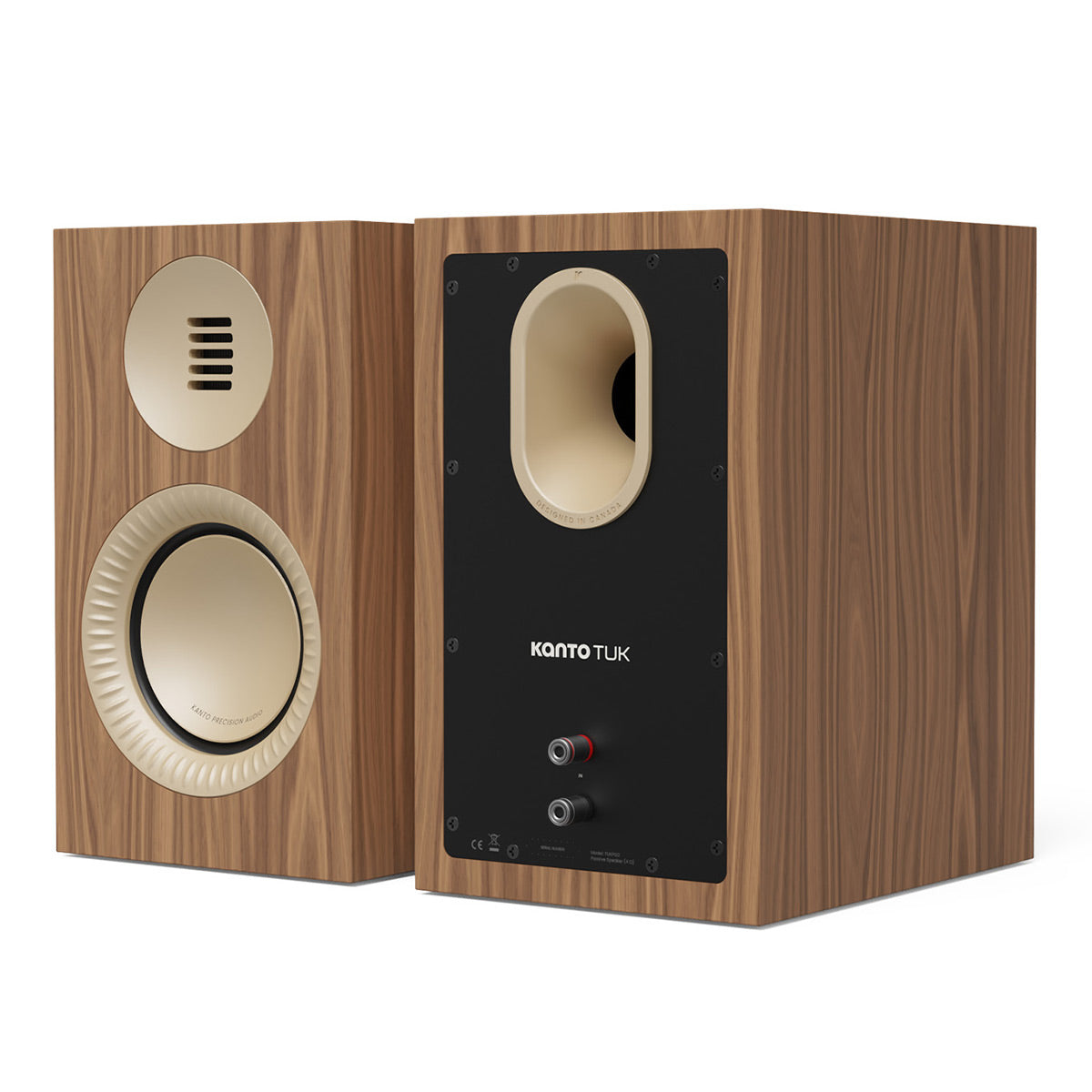 Pair of bookshelf speakers with matte walnut wood finish and cream-colored drivers