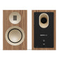 Pair of matte walnut bookshelf speakers with cream-colored drivers and rear binding posts