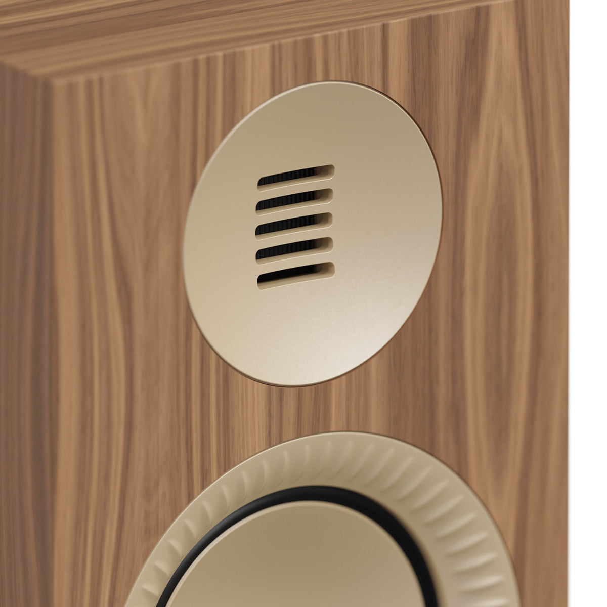 Matte walnut bookshelf speaker with a circular gold-tone tweeter and a textured woofer