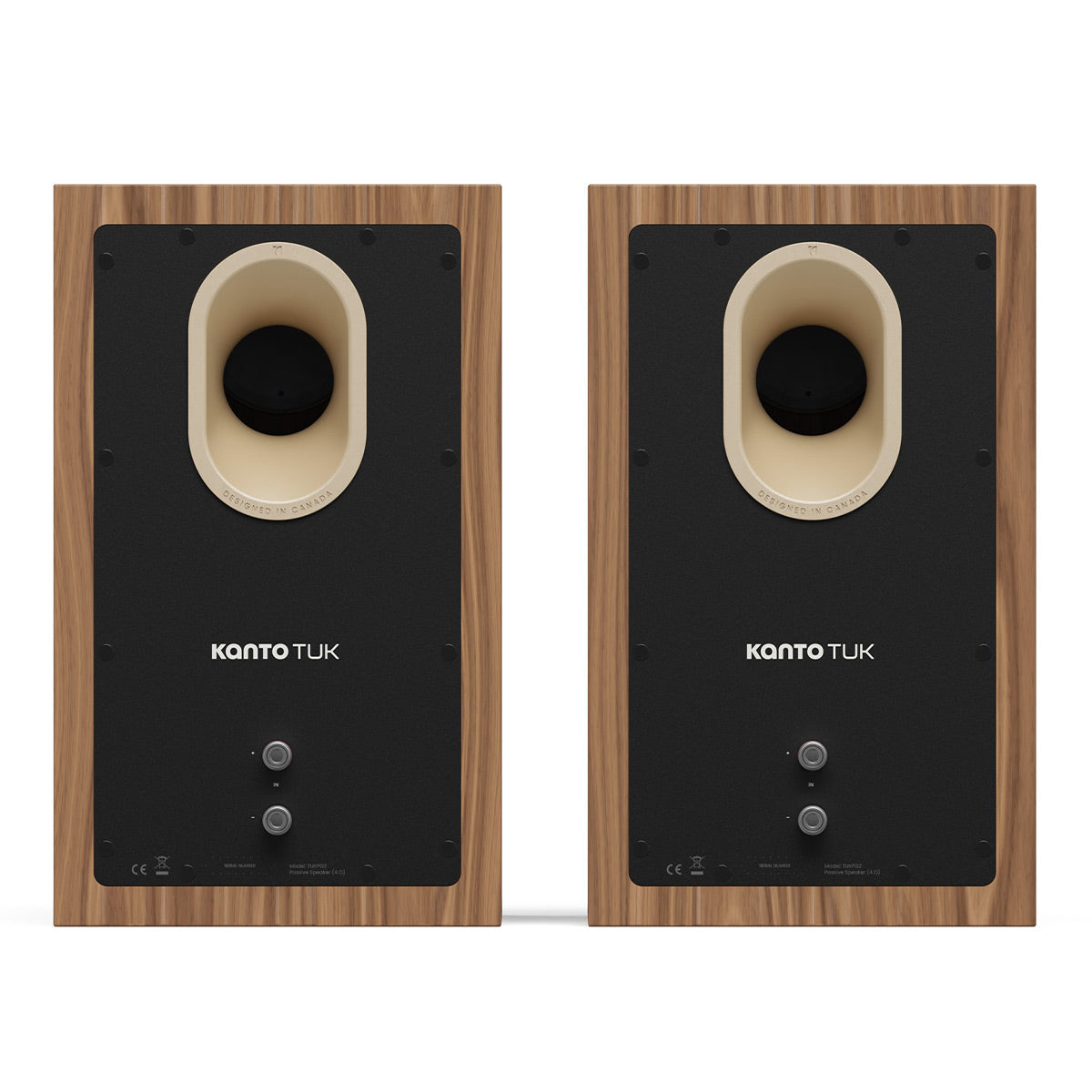 Pair of matte walnut bookshelf speakers with black rear panels and oval bass ports