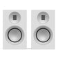 Matte white bookshelf speakers with silver drivers and horizontal tweeter grilles