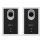 Pair of matte white bookshelf speakers with black front baffles and oval tweeter ports