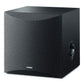 Black powered subwoofer with a front fabric grille and a side-firing port